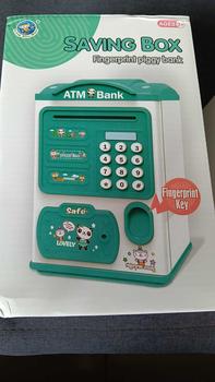 Product Review of Kids Money Saving Box with Password Digital Electric ATM Toys Money Boxes Fingerprint Unlock Tabung ATM Plastic Child Children from i**😘 1