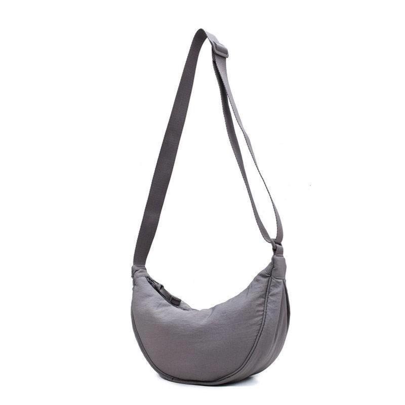 Product Introduction of 【COD】Sling Bag Half Moon Waist Bag/Besar Untuk Perjalanan Dan Selempang Setengah Bulan Uniseks/ Anti Air Waist Bag saddle  bag 20
