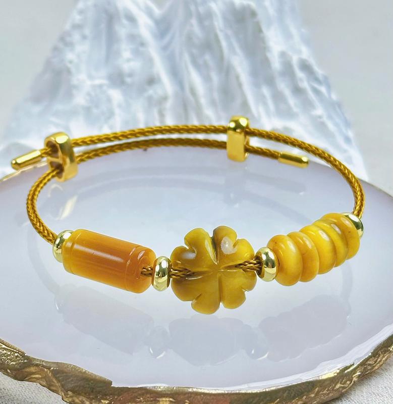 Vòng tay mắt hổ ngũ điếu mix cỏ bốn lá lu thống trợ tiền tài