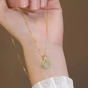 Kalung Titanium Wanita Plus Liontin Model Giok