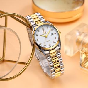 นาฬิกาควอทซ์ผู้หญิง CAINUOS ดีไซน์เรียบหรู พร้อมจอแสดงผลวันที่ ทำจากสแตนเลส สายสีทองและพลอยเทียม เคลื่อนไหวควอทซ์ สไตล์ลำลองและธุรกิจ