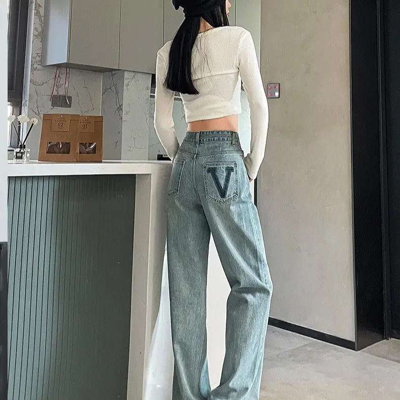MOMO K909  Celana lurus baru dengan desain draped, jeans lebar pinggang tinggi dengan pola monogram skinny jeans regular