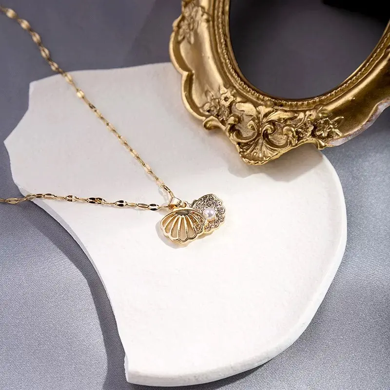 LIVIA - New Light Luxury Hollow Shell Pendant Necklace   French Luxury Pearl Fashion Versatile Clavicle Chain
