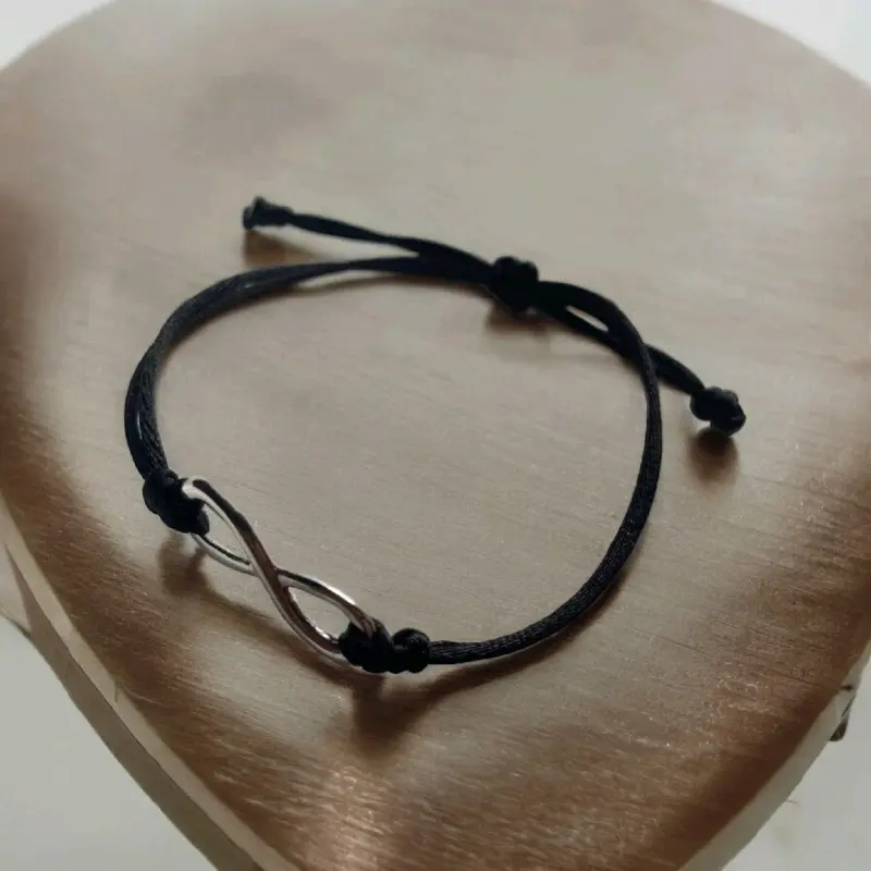 (isi2) Gelang Couple Infinity bracelet Premium - Gelang Pasangan Terbaru Model Simbol Cinta Abadi - Gelang Couple Pria Wanita Stainless Steel Anti Karat - Hadiah Romantis Pacar, Suami, Istri - Gelang  Tali  Hitam Elegan Aksesoris Trendy 1