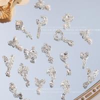 Gambar 10 Pcs Hiasan Kuku Pita Logam Silver Berlian Busur Liontin Tetesan Air Aksesoris Nail Art - Pita dari Shinycat Kota Tangerang 4 Tokopedia