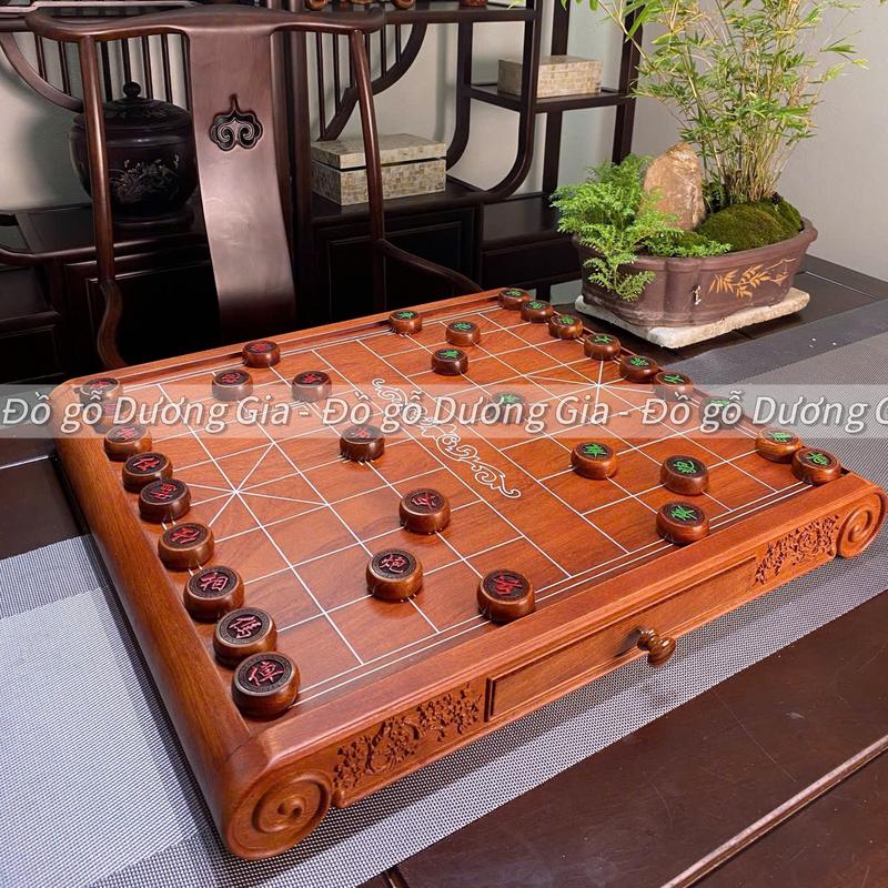 Bàn cờ tướng cờ tướng bằng gỗ mẫu chân quỳ triện hoa mai Cao Cấp