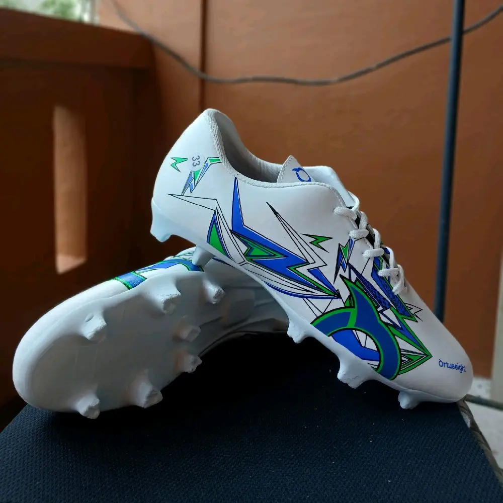Sepatu Bola Anak Remaja Ortus Tuhnderclap Putih Biru