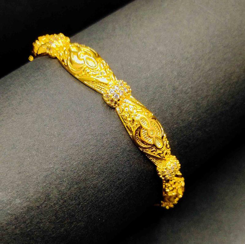Product Introduction of Hot Selling Wholesale Luxury Fine Engagement Jewelry Embossed Design Bracelet Women Hollow 18k Gold Cuff Bangle For Women Family 9