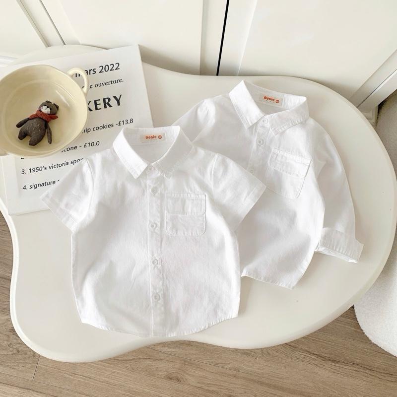 Dosie Form nhỏ Áo sơ mi trắng màu cộc tay dài tay thô lụa cổ đức phối túi dễ thương dành cho bé trai 9-29kg - A130