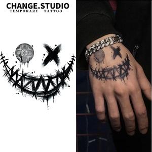 รอยสักชั่วคราว ดีไซน์หน้ายิ้มโจ๊กเกอร์ ติดทนนาน 15 วัน กันน้ำและทนต่อการสึกหรอ สติ๊กเกอร์รอยสัก