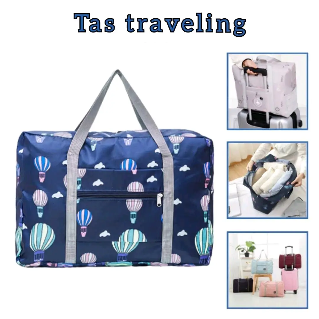 Tas travelling lipat Bahan : Polyester / Parasit Kosong = 55cm X 43cm full isi = 45cm X 39 cm