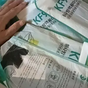 Masker KF94 4Ply Isi 50 Pcs Hitam Putih Earloop JM