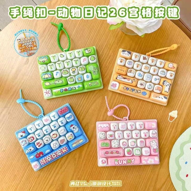 Bàn phím 26 phím, đồ chơi sáng tạo nhấn ngón tay giải tỏa căng thẳng chủ đề Nhật ký động vật, móc khóa túi xách tiện lợi cho trẻ em và học sinh.