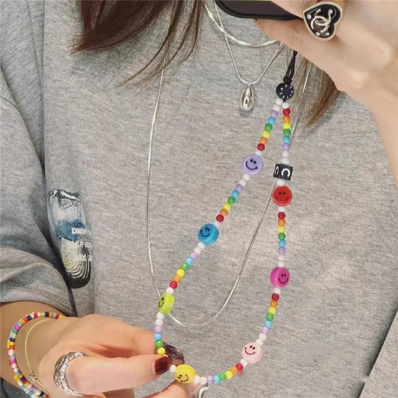Product Introduction of Dopamine color lucky Smiley phone chain short accessory bracelet ccd camera lanyard key chain anti-drop chain 1