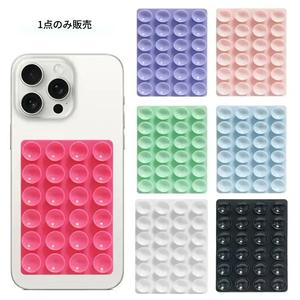 多色のスマートフォン用シリコン吸盤式背面シール、粘着式スマホスタンド、滑り止め自己粘着タイプ、車・家庭で使える汎用アクセサリー