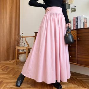 夏の軽やかな素材のロングカジュアルスタイルの女性用スカート、ゆったりとした織り素材で、デイリーウェアに最適です。