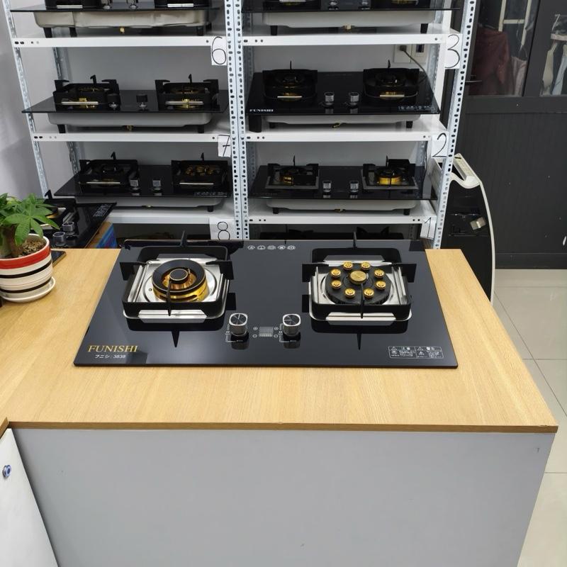 Bếp gas âm cao cấp Funishi 2 trong 1 Phiên Bản Mới Có Cắm Điện kiềng vuông .có cảm biến ngắt gas tự động .có hẹn giờ tắt bếp .1 bên cháy siêu lớn . 1 bên mâm đồng đúc nguyên khối cháy vừa tiết kiệm gá .kính cường lực .kiềng chắn gió.