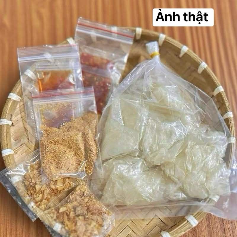  Set 200g Bánh Tráng ủ Bơ Tặng 3-4 gia vị +Muối + sate+ me + ớt rim+ hành - ăn vặt khô  ăn chay dùng được   Xem đầy đủ thông tin trước khi đặt tránh trường hợp huỷ đơn và boom hàng nhé khách ơi !! 