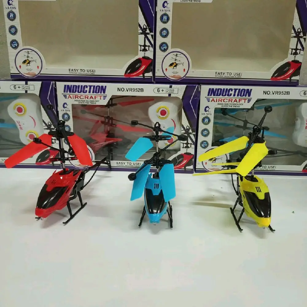 Mainan Helikopter Remot Control_Sensor tangan Warna Warni/Helikopter Remot control Terbang dengan sensor tangan