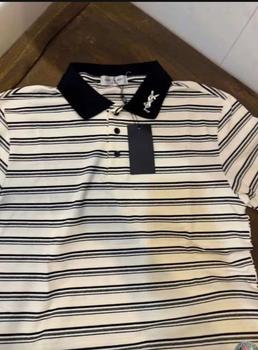 Product Review of áo polo cổ bẻ nam nữ Y ÉT LỜ Đính logo kim loại ở cổ áo siêu sang - áo polo kẻ sọc phối logo kim loại viền cổ cao cấp loại 1 from M**ệ 0