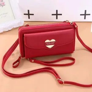 TAS SELEMPANG DOMPET WANITA SERUNI