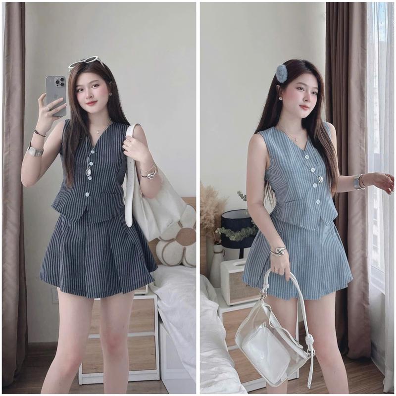 Sét đồ nữ áo gile kẻ sọc phối chân váy ngắn cùng tông màu sang chảnh