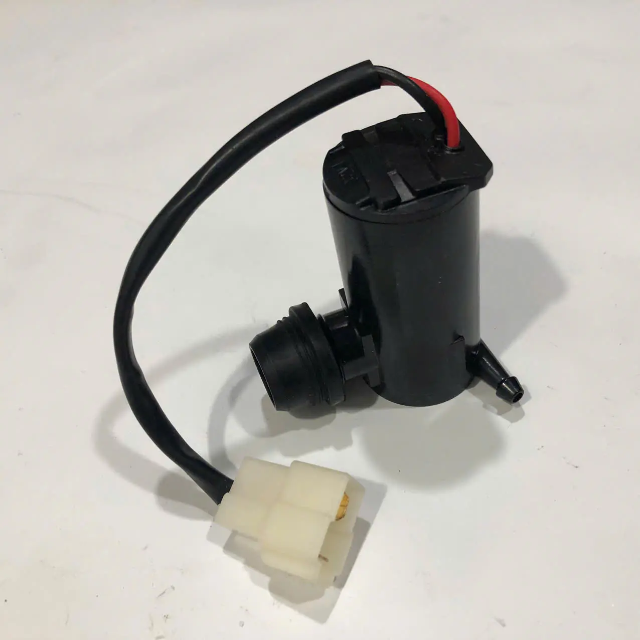 Mô tơ phun nước rửa kính 24v xe ô tô tải Dongfeng Howo Cửu Long Hoa Mai Chiến Thắng