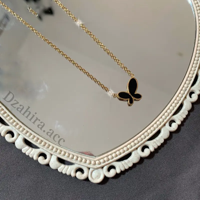 kalung kupu-kupu titanium anti karat dan luntur 1