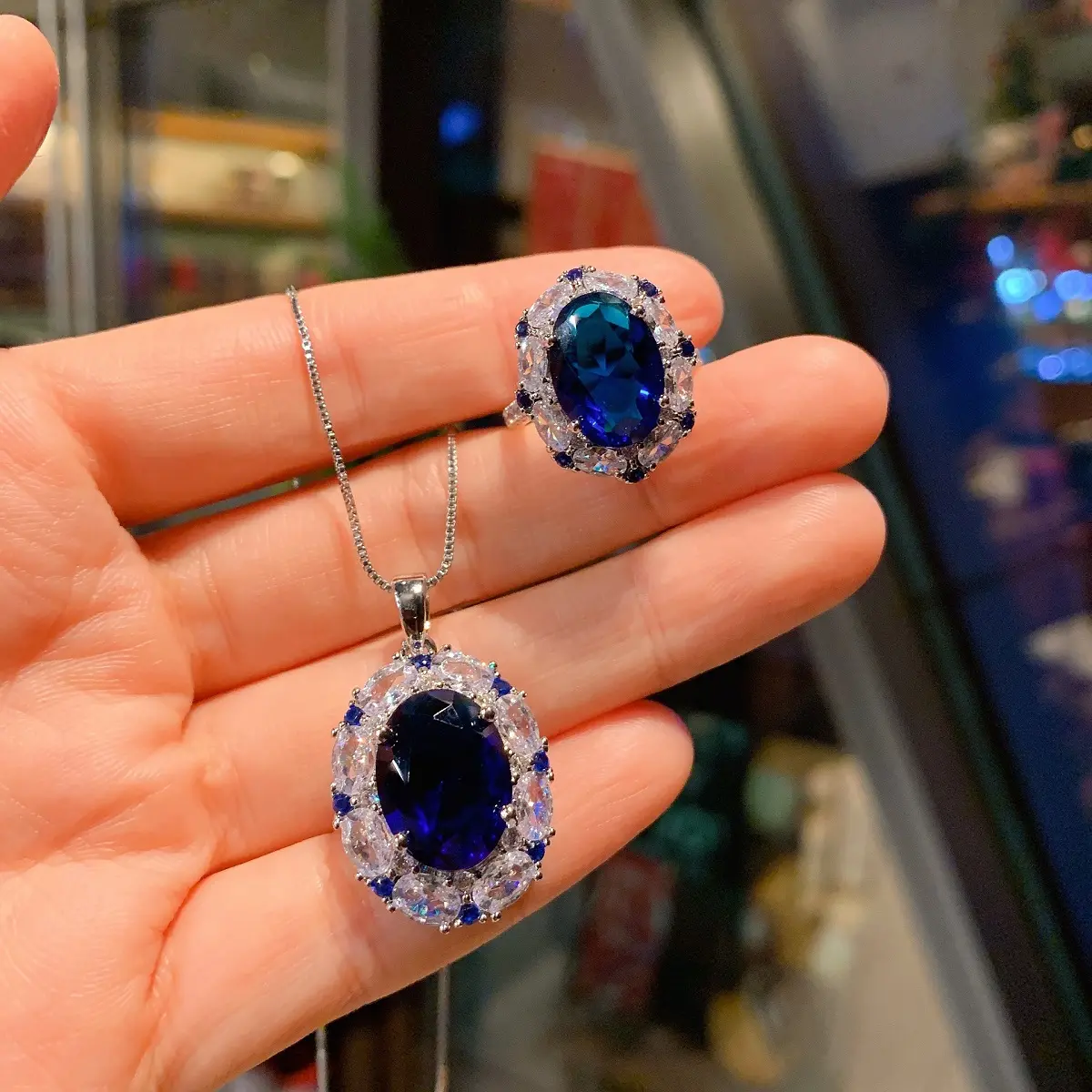 Lux Co.Sapphire pigeon egg necklace,earrings and ring set.