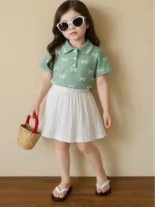 setelan anak perempuan dengan rok plisket motif pita usia 06 bulan sampai 6 tahun