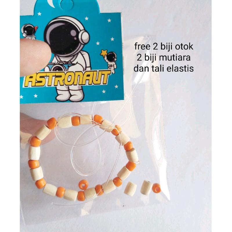GELANG OTOK BAYI ATAU GELANG SAWAN BAYI MUTIARA WARNA OREN 1