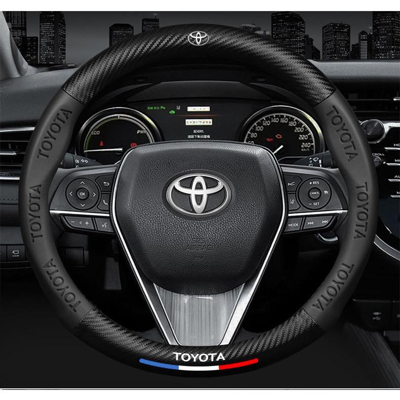 Bọc Vô Lăng Da Sợi Carbon Toyota, 38Cm, Cho Toyota Yaris, VIOS, Corolla, Alitis, Camry, Prius, Wigo, Avanza, Innova, Fortuner, Rush, RAV4, Tundra, Tacoma