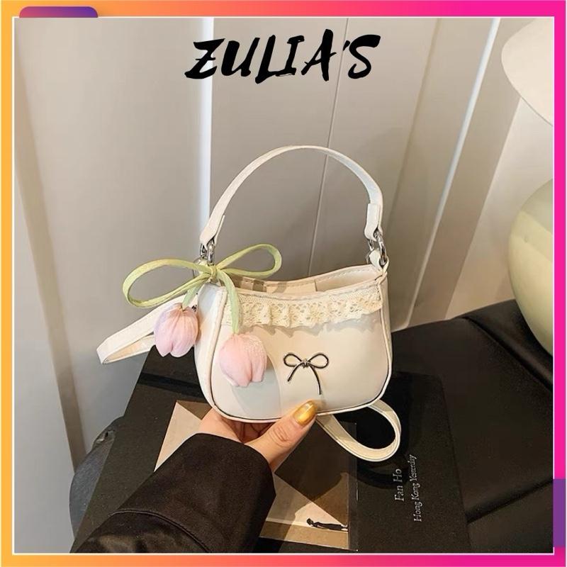 Túi Xách Nữ Mini Đính Nơ Kèm Charm Hoa Dễ Thương - Zulia's