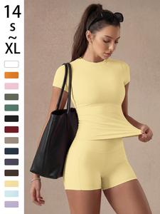 Conjunto de color sólido para mujer, top tipo camiseta básico y versátil, shorts deportivos de moda multiusos que realzan la cintura y levantan los glúteos, yoga y fitness