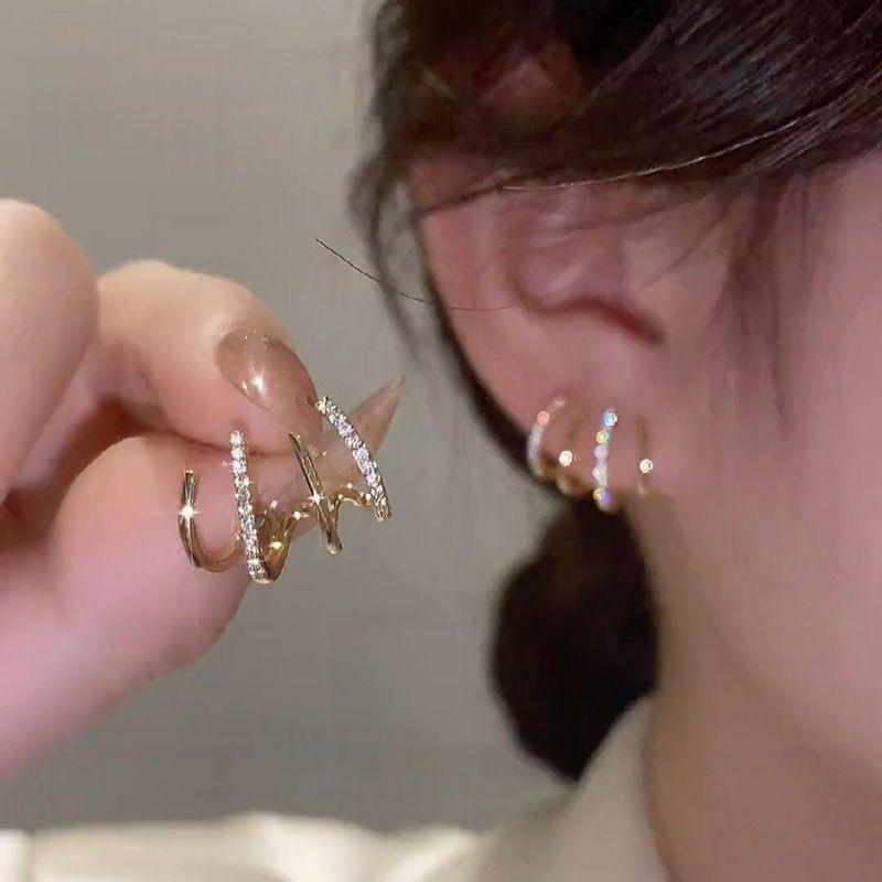 Product Introduction of Women earrings, new fashion, retro style, four-nail nail design, simple earrings 13