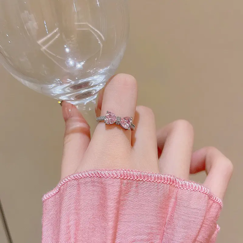ShinyShiny-Cincin busur lucu Cincin hati pink dengan zirkonia berbentuk pita untuk wanita, desain unik dan imut, cincin dengan kesan mewah dan anggun, cocok untuk jari telunjuk, desain terbaru. 1