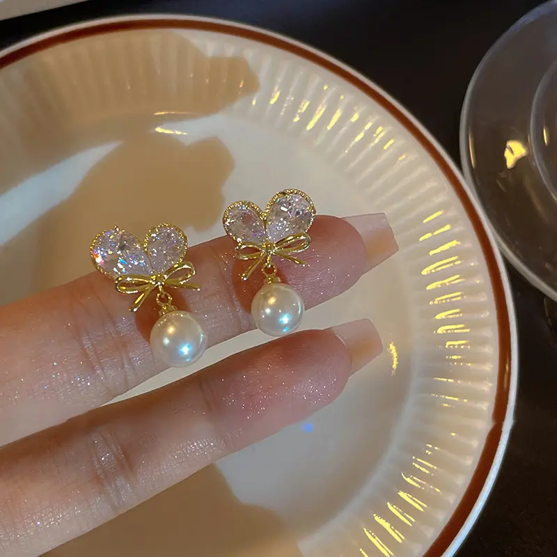 Sweet Love Butterfly Knot Pearl Earrings Female Korean Personality Simple and Versatile temperament Fashion Earrings and Accessories