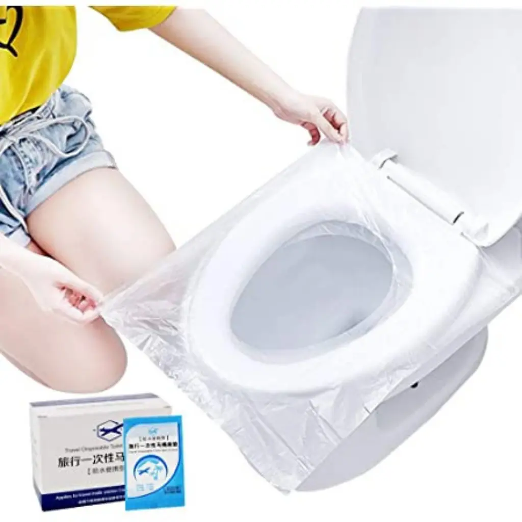 Travel Disposable Toilet Seat Cover / Alas Duduk Kloset Toilet (Plastik/Kertas)