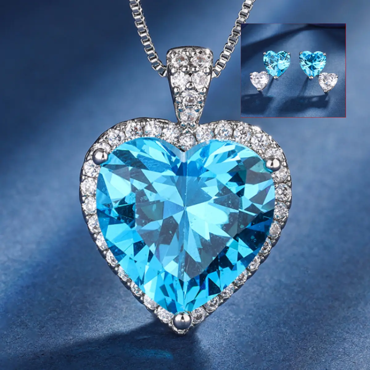 Lux Co.Aquamarine heart-shaped design necklace and earrings set.