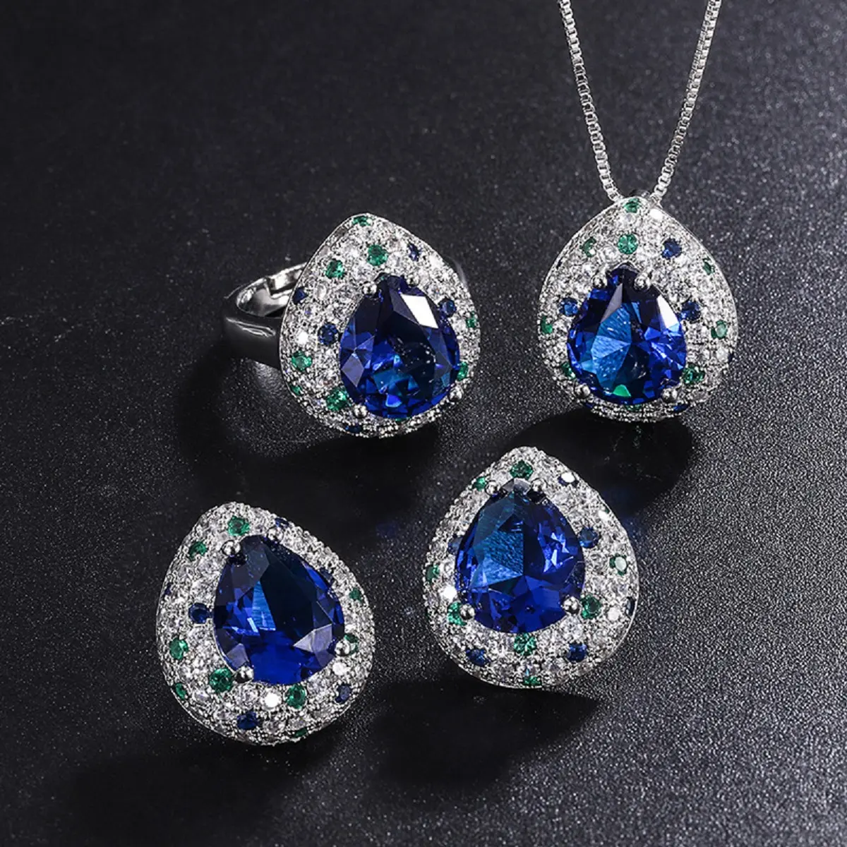 Lux Co.Sapphire water drop necklace,earrings and ring set.