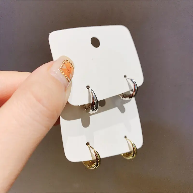 【lingerly】Anting tetesan air sederhana Eropa dan Amerika Serikat anting angin dingin anting logam retro Z 4