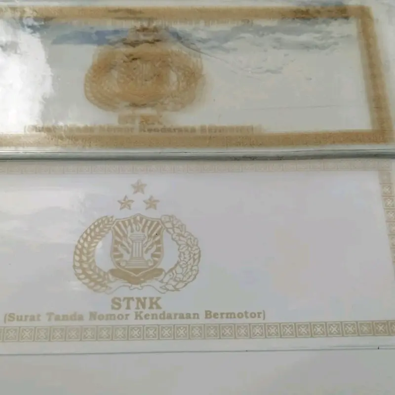 plastik sntk (isi 2lembar) cover pembungkus stnk logo warna gold 0