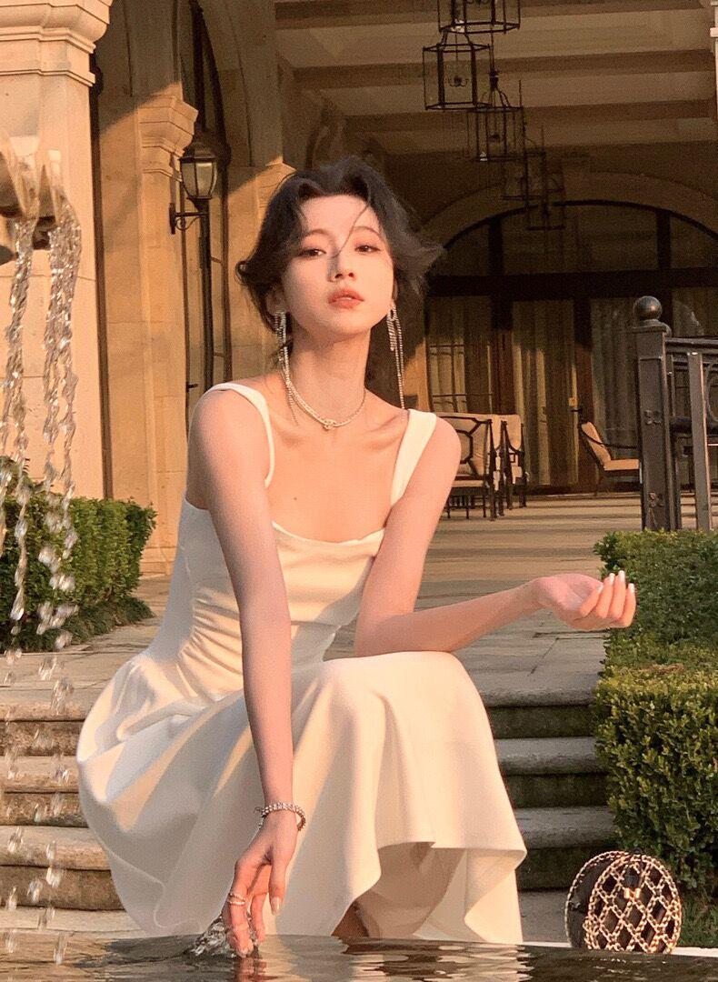 Product Introduction of Women's new slim fit mid length dress, solid color suspender dress, waist cinching, niche design for girls, women's mid length dress Casual Womenswear 5