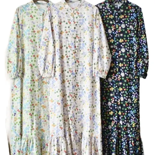 Anna Long Dress - Maxi style dress with full front functional buttons. There’s ruffles at the bottom at end of ththee dress with rubberised sleevsleevees. You can opt to wear it as an outer too! Women