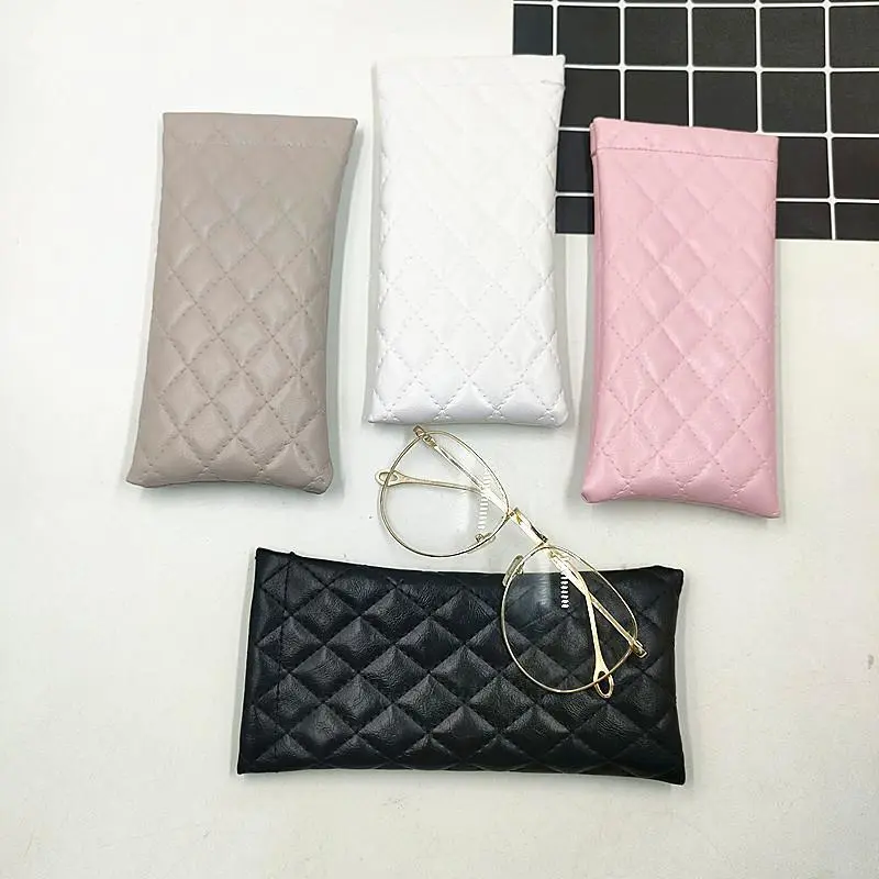 Glasses bag with automatic closure and elastic mouth, leather portable myopia glasses case, men's and women's waterproof glasses storage bag