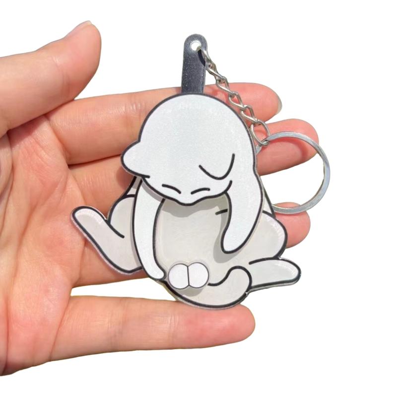 The Cat Keychain That Plays With Its Own Balls — And Nobody Can Look Away