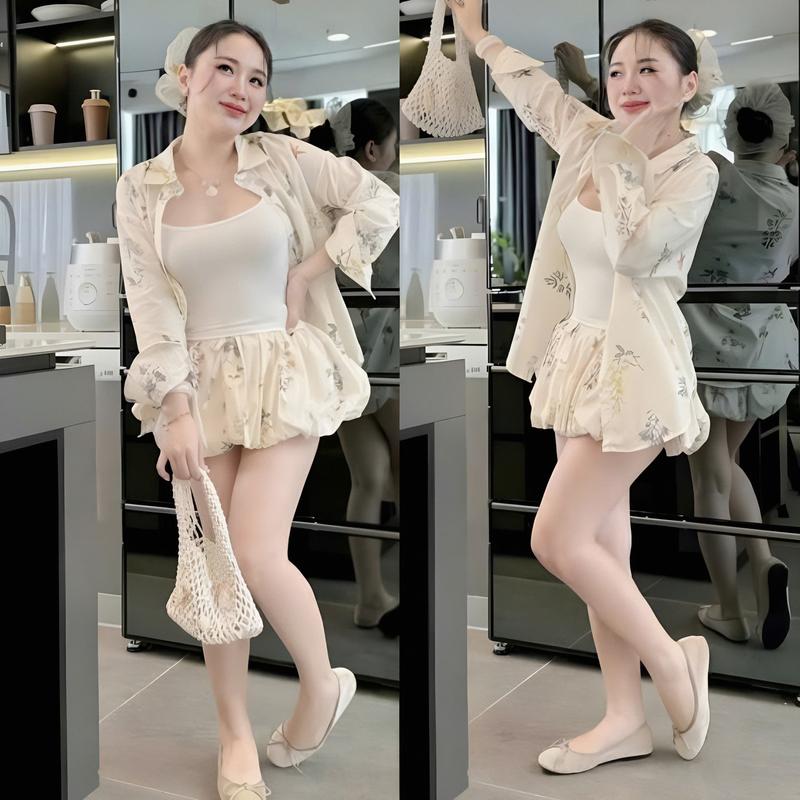 Sét váy nữa mango lụa áo trong tăm kèm khoác ngoài dài tay mix chân váy bí ngắn có lót xinh xắn dành cho các nàng diện đi chơi.