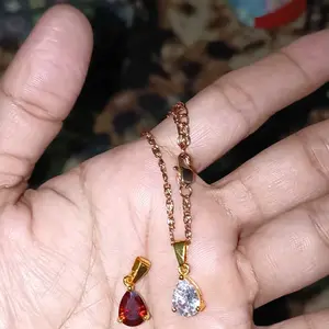 LIONTIN TITANIUM TETES MODEL TERBARU DAN KEKINIAN Dengan Pilihan Warna Hitam Putih dan Coklat untuk Tampilan Mewah