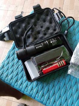 Product Review of Senter Super Terang Waterproof LED Rechargeable Baterai Tactical Anti Air Lampu SWAT Zoom Murah Free Charger from G**Y 1