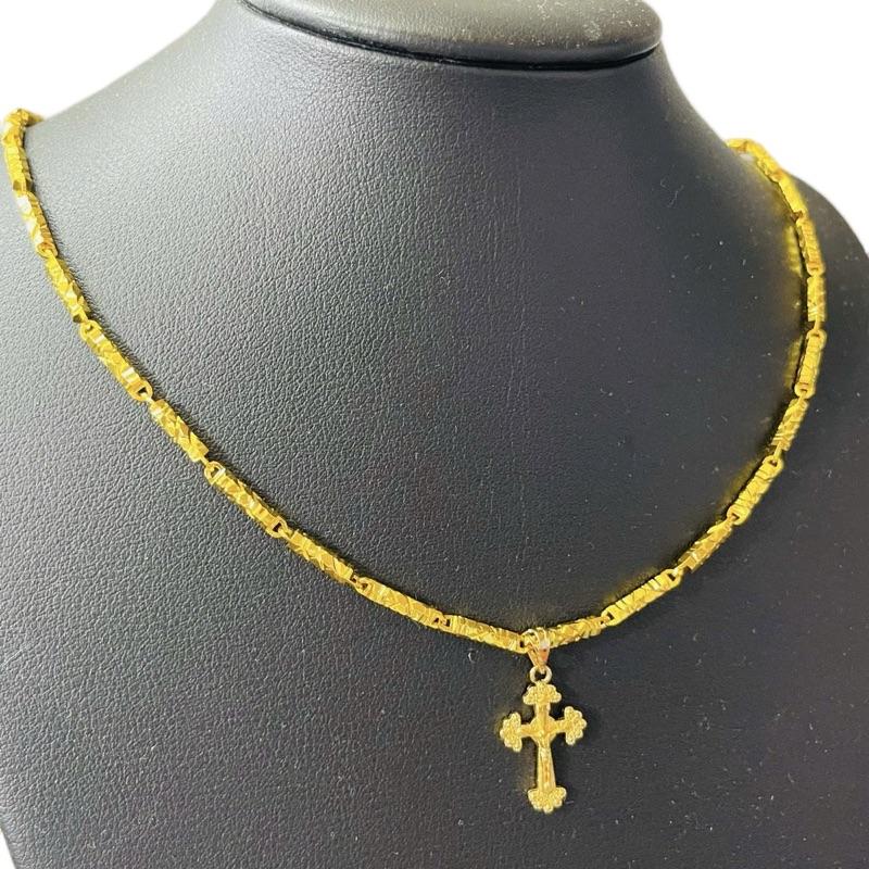 Dây chuyền đốt trúc và mặt thánh giá